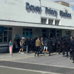 Masked demonstrators at Dover’s migrant port